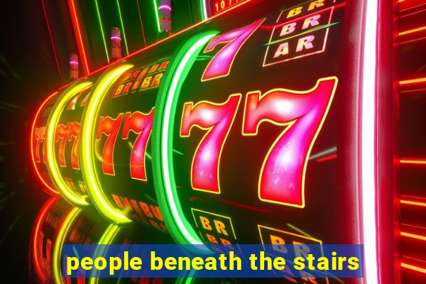 people beneath the stairs